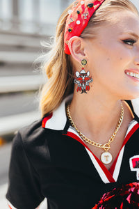 Raider Red glitter earrings by Brianna Cannon